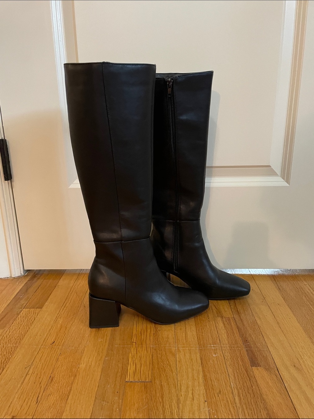 Black knee length boots